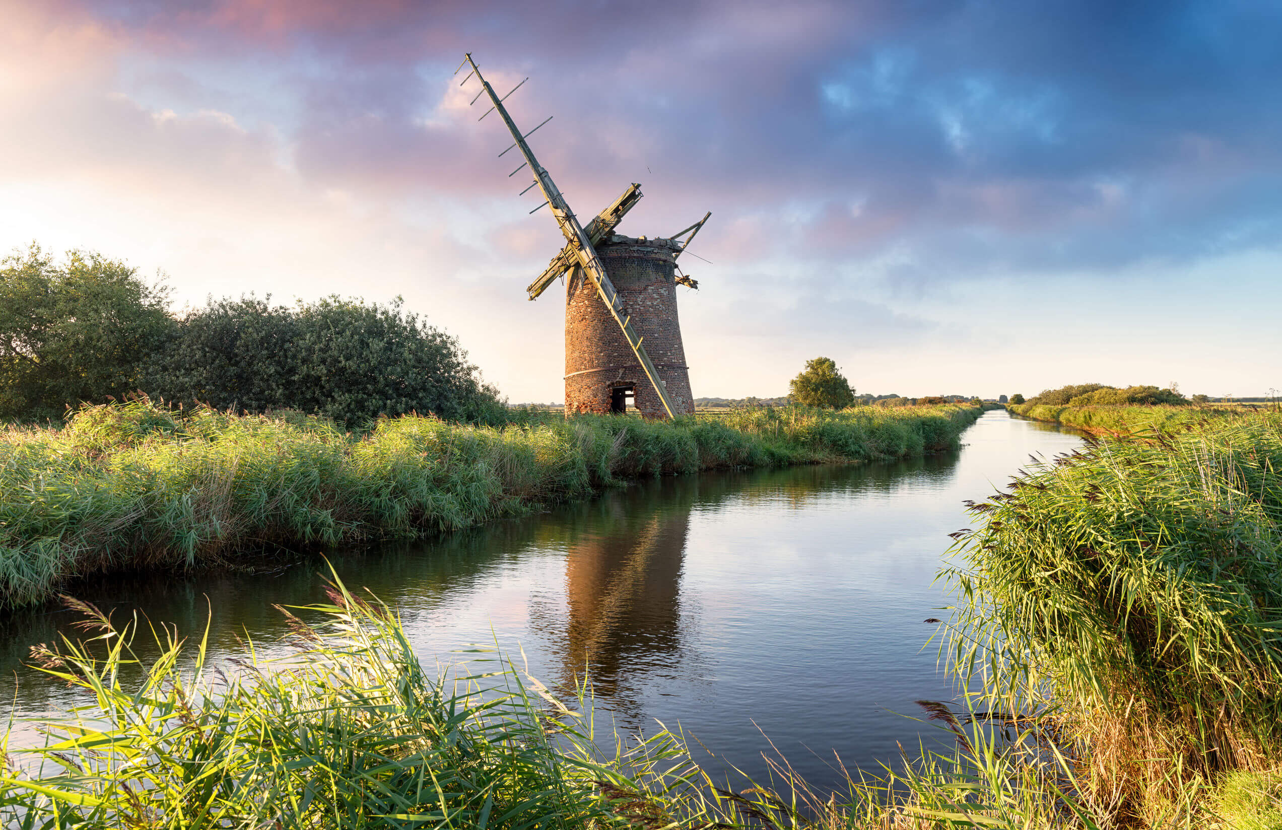 Thr ruins of the Brograve Windmill on the Norfolk Broads at Sea Palling