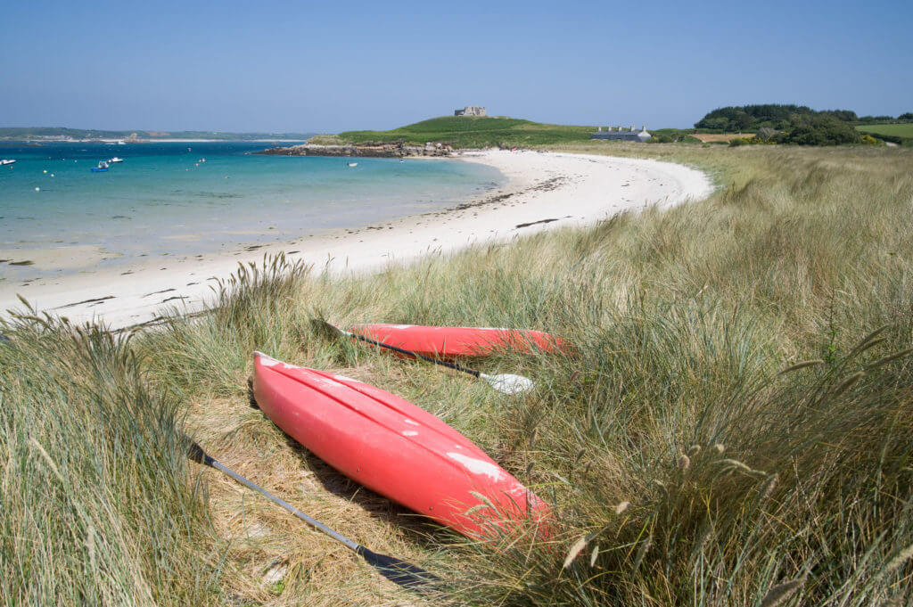 Kayaks on old grimsby beach on tresco