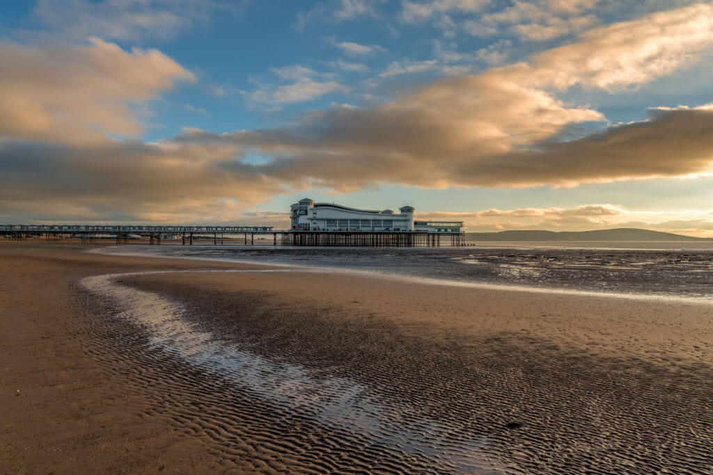 Weston-super-Mare, North Somerset, England, UK - October 04, 2018: View over the beach and the Grand Pier