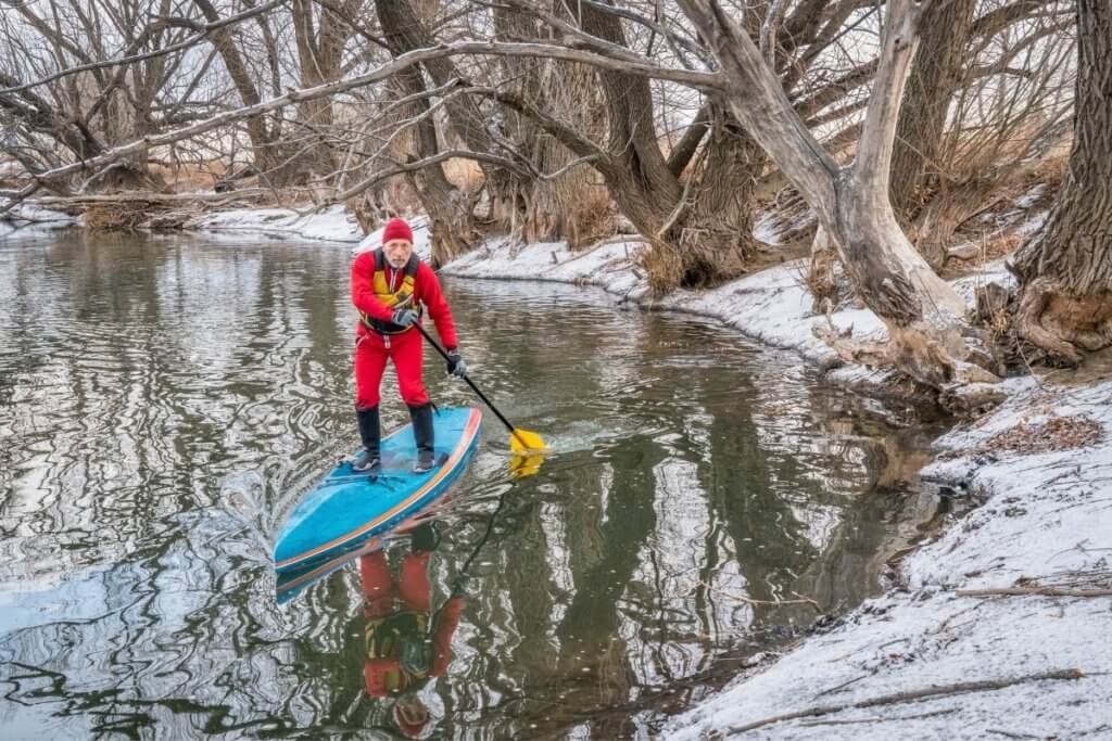 Wintry paddleboarding in England 