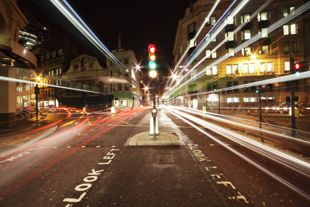 traffic lights in the center of London at night