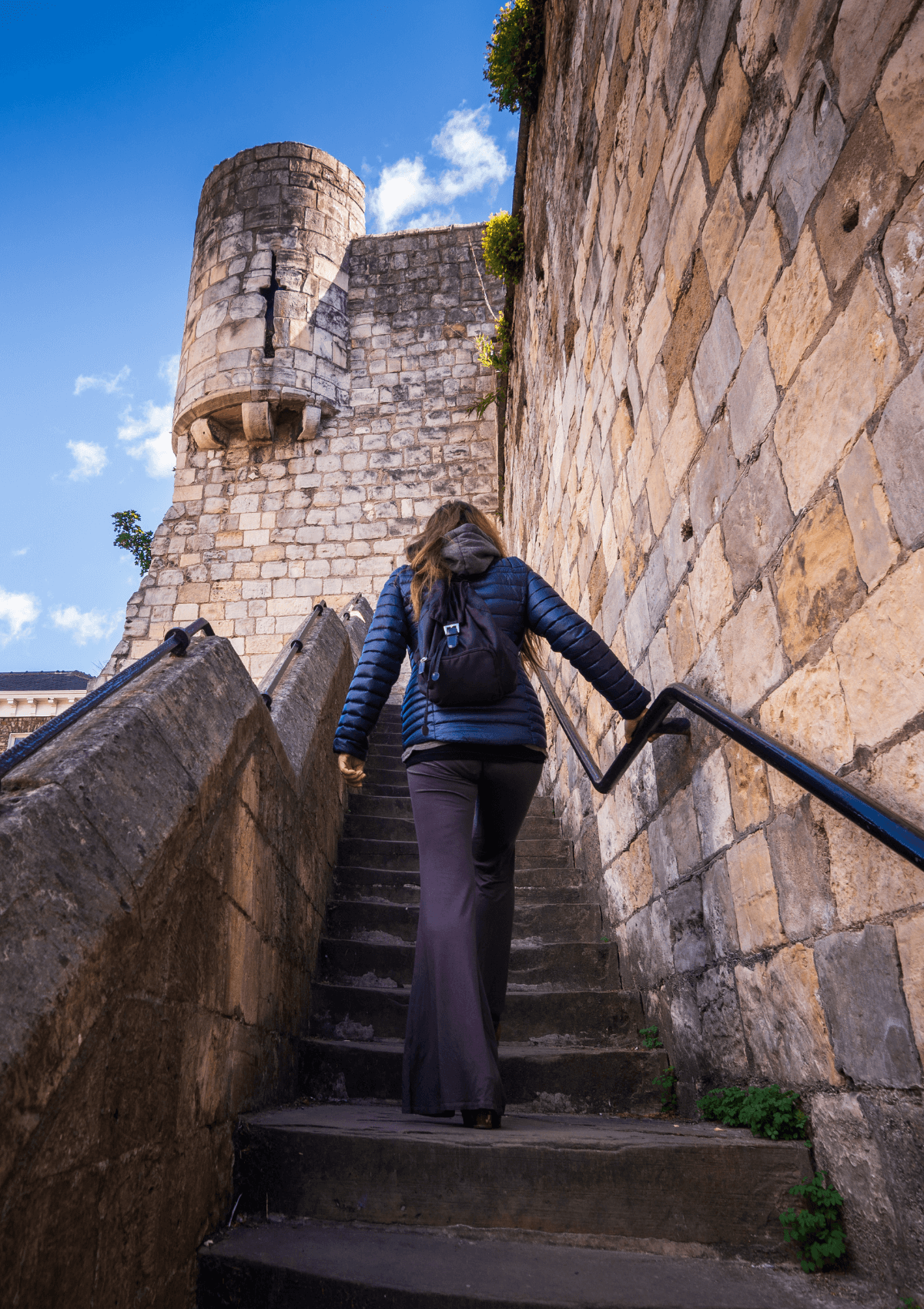 Woman exploring city walls