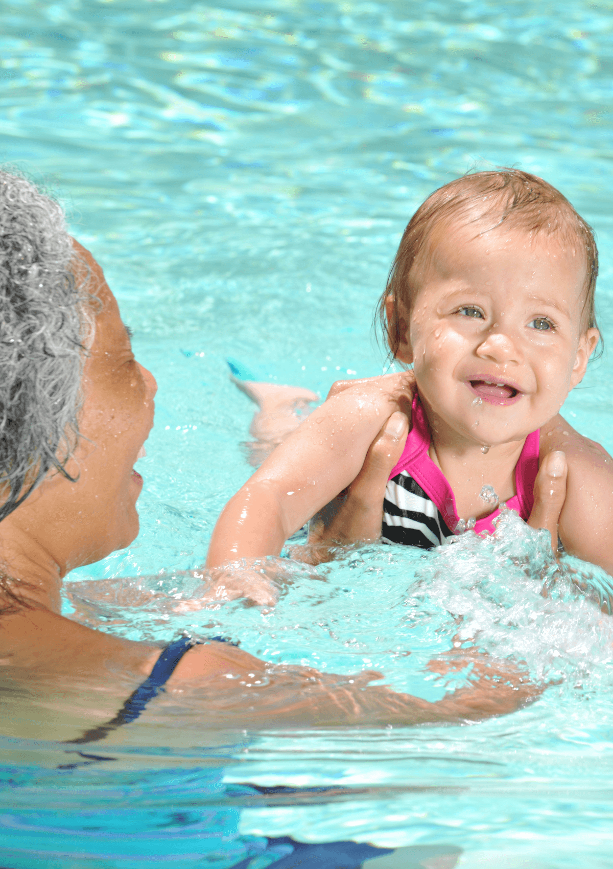 Toddler learning to swim 